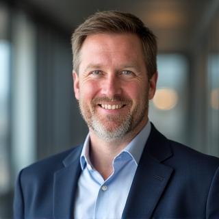 Professional headshot of James Robertson